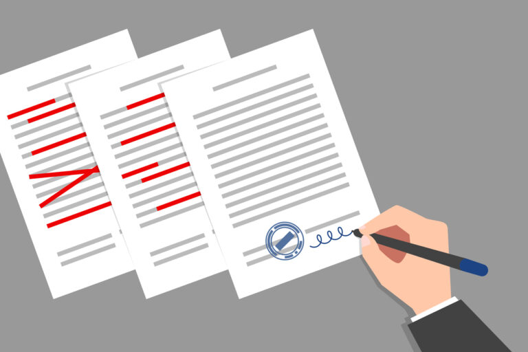 Stack of documents with corrections, and signing of final corrected document